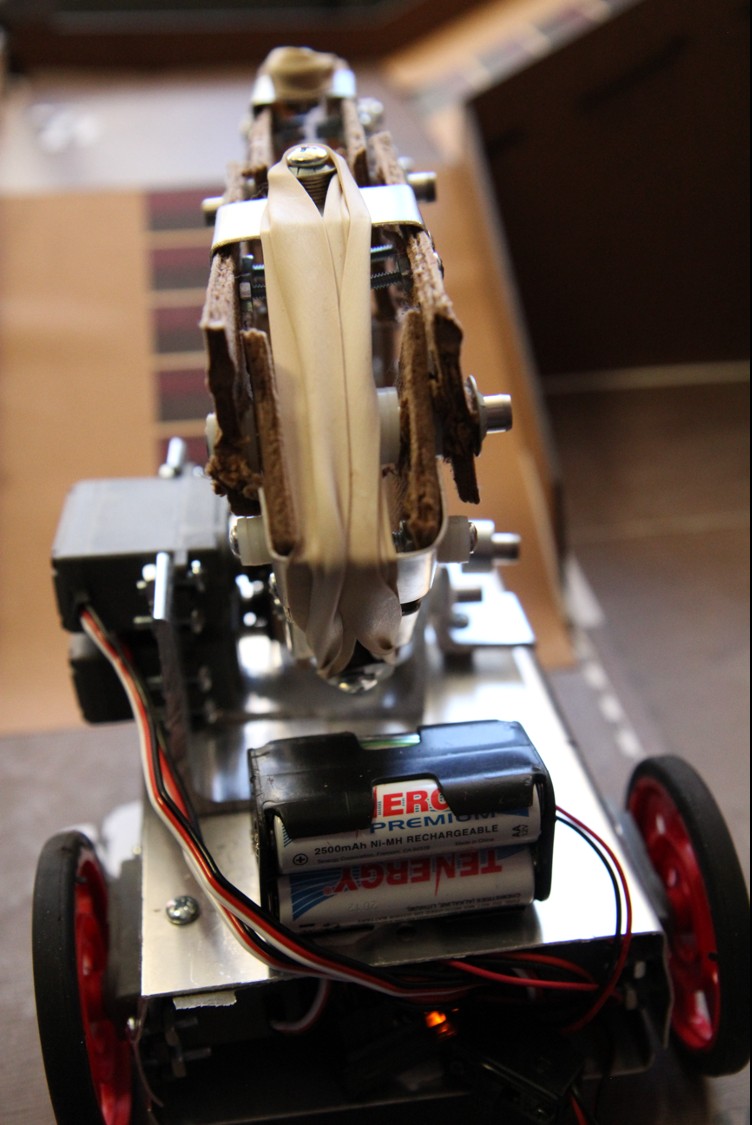 Robot front view with arm and drive system